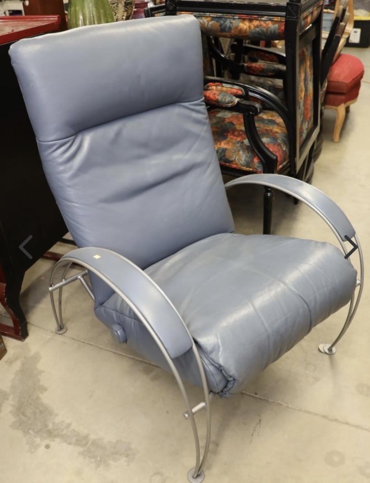Blue-gray leather Lafer Billie recliner with a curved silver metal frame